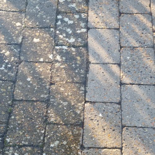 fliser efter afrensning i Aarhus. Flisepesten er væk og tilbage er smukke herregårdssten.
